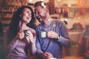 Couple dating in cafe at xmas
