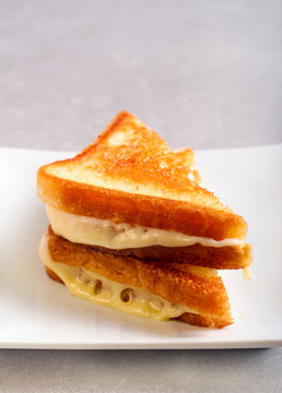 Grilled cheese sandwich with melted cheese
