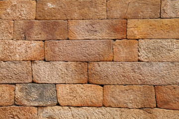 Obraz premium Sandstone brick pattern on the wall of Qutub Minar