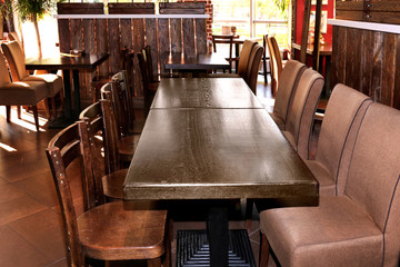 Lacquered table and chairs in modern cafe