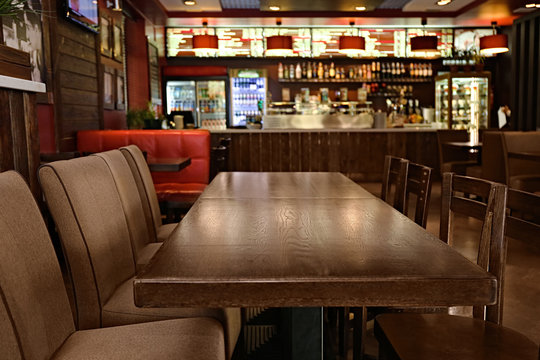 Lacquered table and chairs in modern cafe
