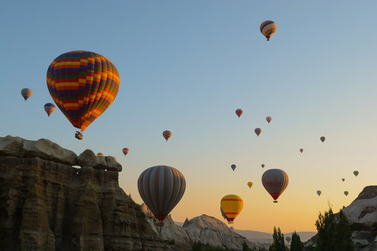 Fototapeta Hot air balloons cruising over Cappadocia, Anatolia, Turkey Minor