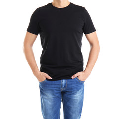 Obraz premium Handsome young man in blank black t-shirt on white background, close up