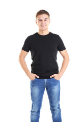 Fototapeta premium Handsome young man in blank black t-shirt on white background