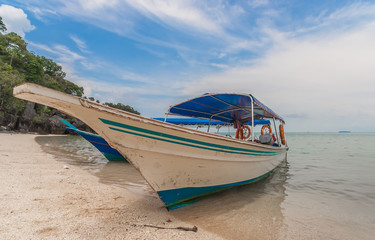 Fototapeta premium Traditional wooden boat at the beach of Langkawi island