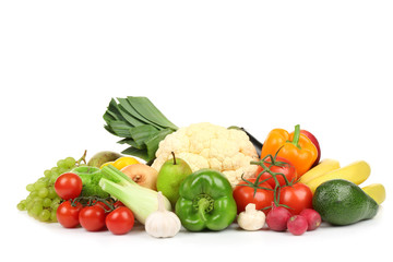 Group of fresh vegetables and fruits on white background