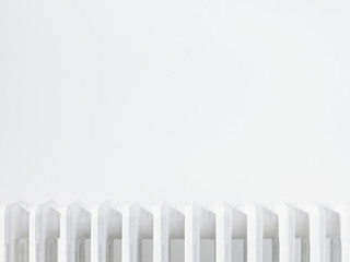 Close up of radiator against white wall