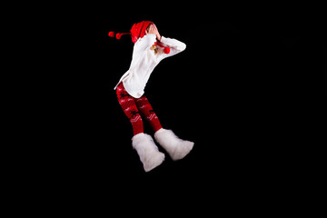 Fototapeta na wymiar Christmas elf acrobat