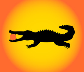 Black crocodile with a bright sun in the mouth