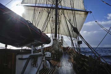 looking at sails of a tallship or squarerigger at sea