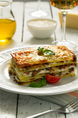 Traditional Italian lasagna made with minced beef. Side view