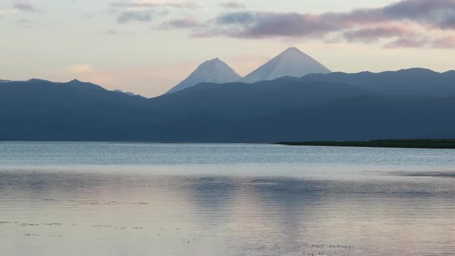 Volcanic cones behind lake