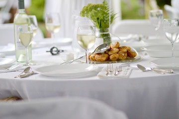 All White Place Setting White Wine Green Flowers