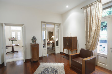 Interior of living room with furniture in colonial style house