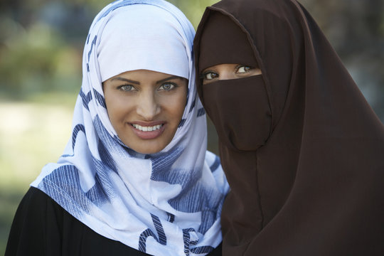 Portrait of two Indian Muslim female friends in traditional clothes