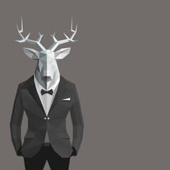 Fototapeta premium Stylish deer in black suit.Gray background.