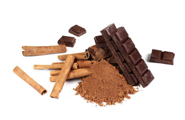 chocolate bars with cinnamon sticks and pile cocoa powder isolated on white  