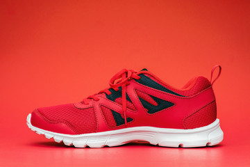 Red sport running shoes