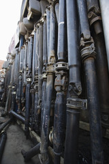 Row of car parts in junkyard