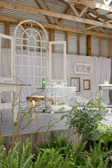 Rustic Wedding Decor in a Barn - Pink, White, and Wood Elements