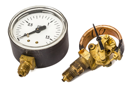 Pressure gauge mechanism in disassembled form, isolated on white