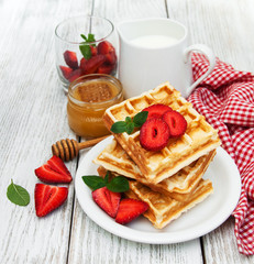 belgian waffles with strawberries and mint