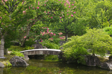 Fototapeta na wymiar Japan Himeji Himeji Koko-en Gardens stone bridge over stream