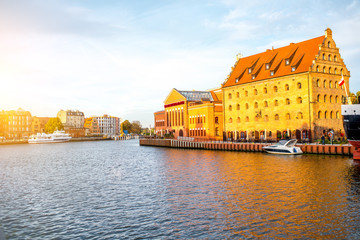 Obraz premium View on Motlawa river and riverside on the sunset in Gdansk, Poland