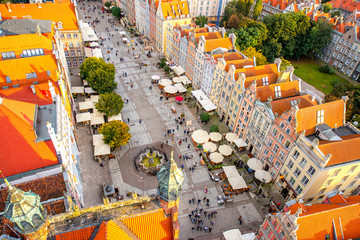 Aerial cityscape view on the market square with beautiful rooftops in the old town of Gdansk, Poland