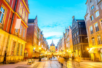 Naklejka premium Night view on the illuminated main street in the center of the old town in Gdansk, Poland