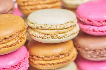 A pile of colorful french macaroons