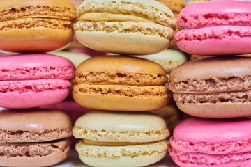 A pile of colorful french macaroons