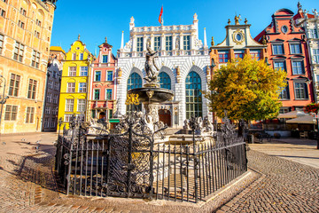 View on the famous Neptune fountain in the center of the old town of Gdansk, Poland © rh2010