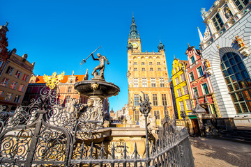 View on the town hall and famous Neptune fountain in the center of the old town of Gdansk, Poland © rh2010