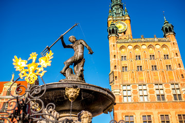 View on the town hall and famous Neptune fountain in the center of the old town of Gdansk, Poland © rh2010
