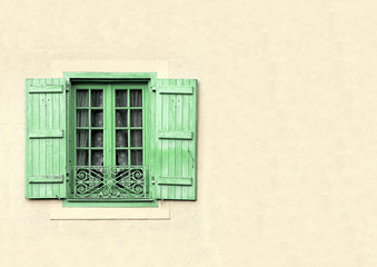 Green shuttered window with copy space