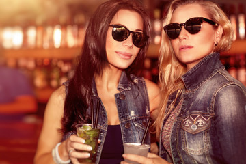 Two gorgeous women in the bar