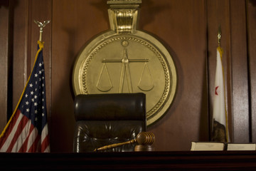 Closeup of judge's seat and gavel in court room