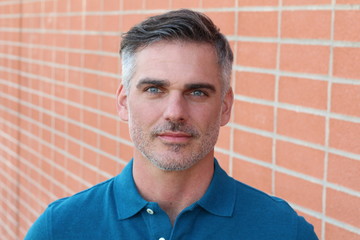 Man with slat and pepper hair close up