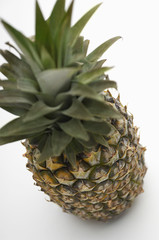 High angle view of a fresh pineapple isolated over white background