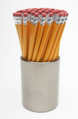 New pencils in container isolated over white background
