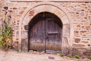 Fototapeta na wymiar Old door of a Spanish house