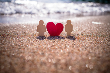 Fototapeta premium romantic symbol of man and woman with a heart 