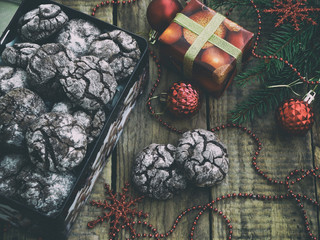 box christmas cookies chocolate with cracks.Decorated with festive decoration. Advent cakes. New Year and Xmas card. Selective focus. Copy space