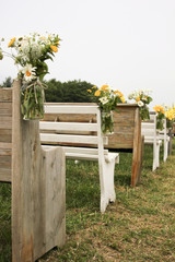 Vintage Church Pews Seating for Outdoor Vintage Wedding with Yellow and White Flowers