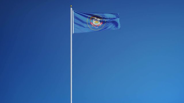 Utah (U.S. state) flag waving in slow motion against blue sky, seamlessly looped, long shot isolated on alpha channel with black and white matte, perfect for film, news, composition