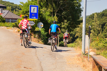 Obraz premium Pilgrimn bikers along the way of St. James
