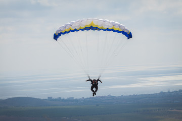 Two paraglider above the valley