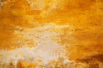 Empty space. Worn rough surface yellow. Old wall. Abstract orange texture