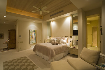 View of a luxury and spacious bedroom in a house